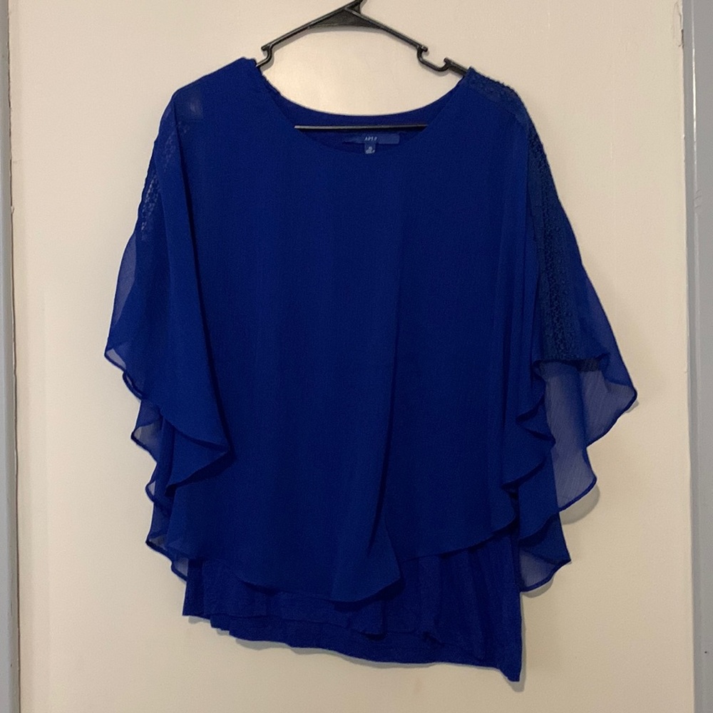 Blue blouse perfect for a night out or business casual. Pet & smoke free home!